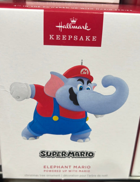 Super Mario-themed figurine in a box with a visible brand logo.