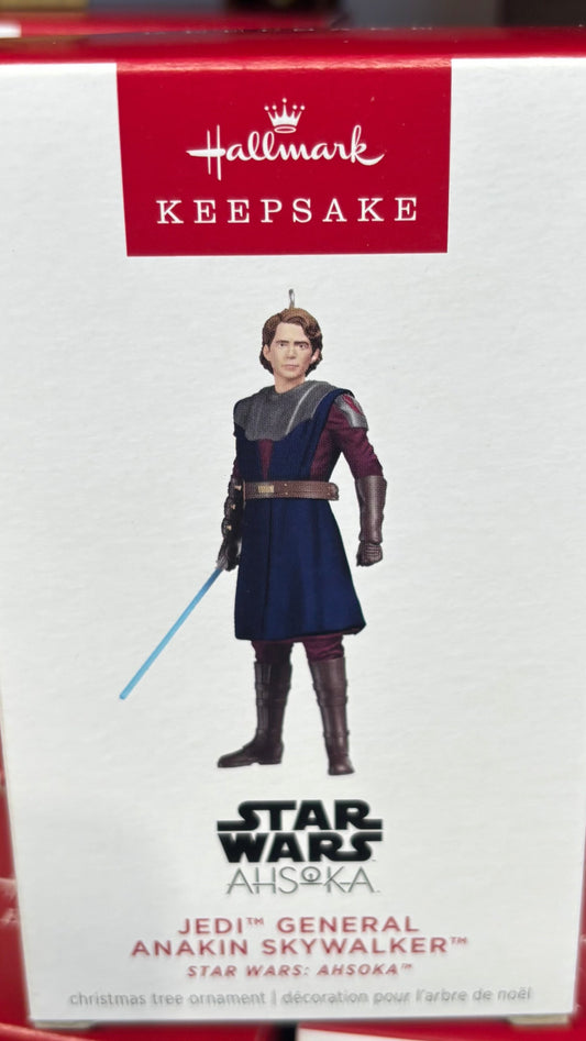 Hallmark Star Wars Jedi General Anakin Skywalker Keepsake box on a shelf with other boxes.