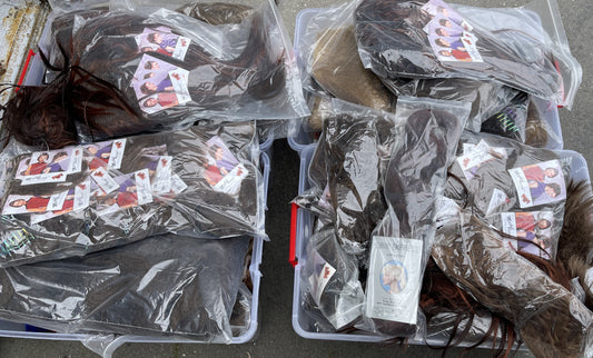 Box Lot Bulk Hair extensions and hair pieces.